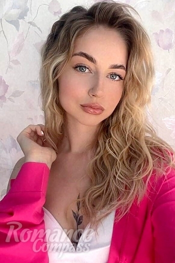 Ukrainian mail order bride Lesia from Ivano-Frankivsk with blonde hair and blue eye color - image 1