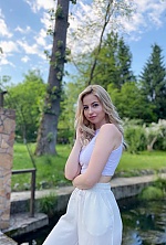 Ukrainian mail order bride Lesia from Ivano-Frankivsk with blonde hair and blue eye color - image 7