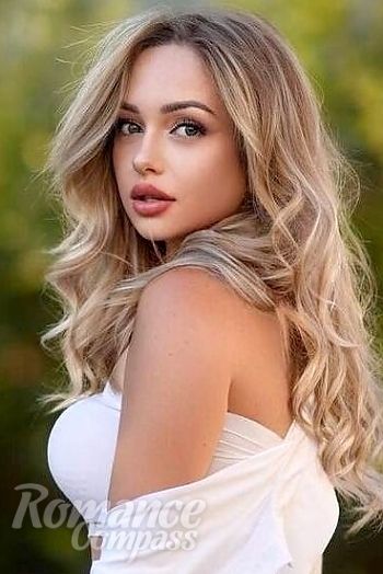 Ukrainian mail order bride Alondra from Berlin with blonde hair and blue eye color - image 1