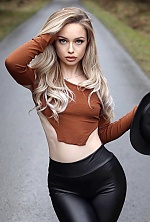 Ukrainian mail order bride Alondra from Berlin with blonde hair and blue eye color - image 5