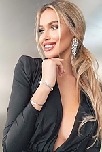 Ukrainian mail order bride Aiulina from Dubai with blonde hair and brown eye color - image 5