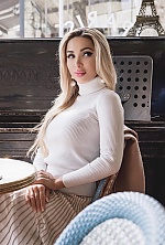 Ukrainian mail order bride Rosa from Baku with blonde hair and blue eye color - image 7