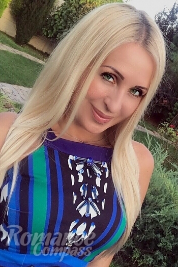 Ukrainian mail order bride Tatyana from Nikolaev with blonde hair and green eye color - image 1