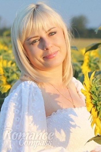 Ukrainian mail order bride Natalia from Nikolaev with blonde hair and blue eye color - image 1