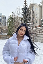 Ukrainian mail order bride Luisa from Calgary with black hair and hazel eye color - image 9