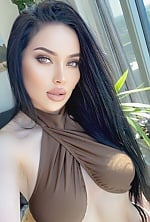 Ukrainian mail order bride Luisa from Calgary with black hair and hazel eye color - image 14