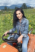 Ukrainian mail order bride Luisa from Calgary with black hair and hazel eye color - image 10