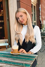 Ukrainian mail order bride Lilia from Krakow with blonde hair and green eye color - image 3
