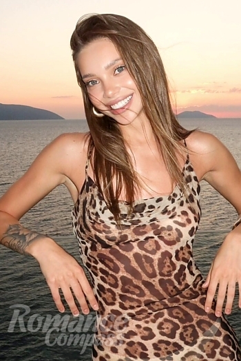 Ukrainian mail order bride Diana from Steyr with light brown hair and blue eye color - image 1