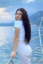 Ukrainian mail order bride Eugenia from Madrid with black hair and blue eye color - image 6