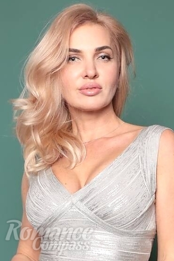 Ukrainian mail order bride Yana from Dnipro with blonde hair and green eye color - image 1