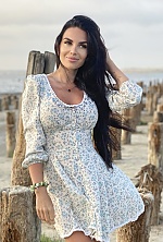 Ukrainian mail order bride Olga from Kyiv with black hair and green eye color - image 2