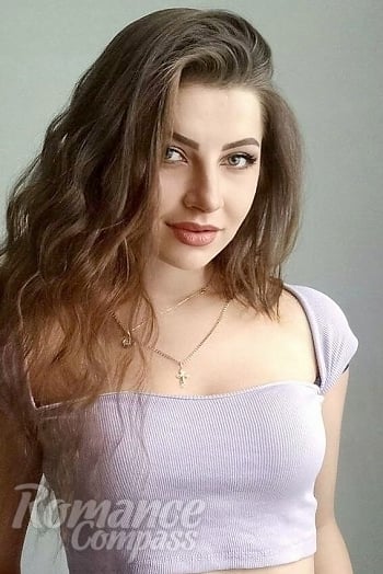 Ukrainian mail order bride Diana from Kyiv with brunette hair and blue eye color - image 1