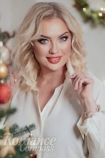 Ukrainian mail order bride Natalia from Bucharest with blonde hair and grey eye color - image 1