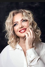 Ukrainian mail order bride Natalia from Bucharest with blonde hair and grey eye color - image 2