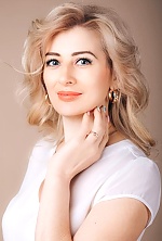 Ukrainian mail order bride Oksana from Kiev with blonde hair and blue eye color - image 3