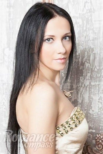 Ukrainian mail order bride Mariya from Krakow with black hair and blue eye color - image 1