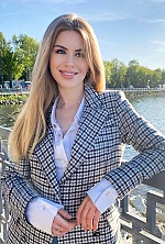 Ukrainian mail order bride Arina from Kiev with blonde hair and blue eye color - image 2