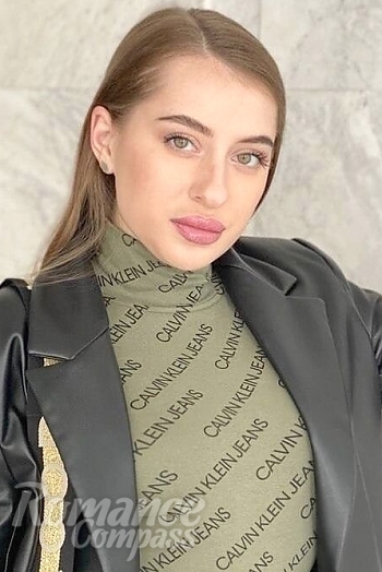 Ukrainian mail order bride Ekaterina from Kamenskoye with light brown hair and green eye color - image 1