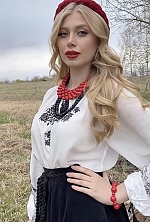 Ukrainian mail order bride Nadezhda from Kiev with blonde hair and green eye color - image 13