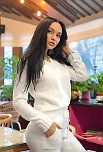 Ukrainian mail order bride Alina from Lviv with black hair and green eye color - image 13