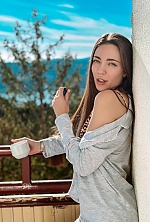 Ukrainian mail order bride Alina from Kyiv with light brown hair and blue eye color - image 10
