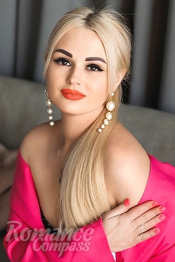 Ukrainian mail order bride Ludmyla from Nikolaev with blonde hair and hazel eye color - image 1