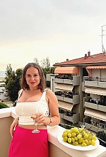 Ukrainian mail order bride Tatiana from Uzhgorod with light brown hair and green eye color - image 4