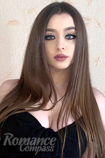 Ukrainian mail order bride Tetiana from Cherkasy with light brown hair and blue eye color - image 1