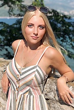 Ukrainian mail order bride Eva from Kiev with blonde hair and blue eye color - image 9