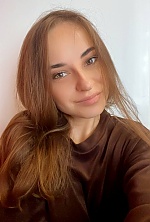 Ukrainian mail order bride Anna from Kiev with light brown hair and hazel eye color - image 7