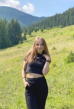 Ukrainian mail order bride Anna from Kiev with light brown hair and hazel eye color - image 2
