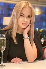 Ukrainian mail order bride Anna from Kiev with blonde hair and green eye color - image 4