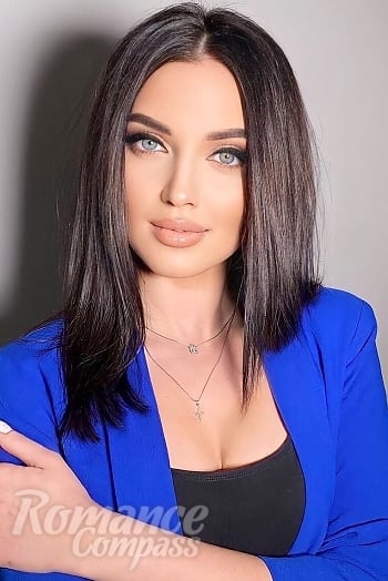 Ukrainian mail order bride Oksana from Cherkasy with black hair and blue eye color - image 1