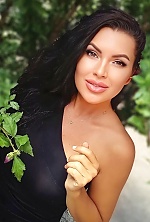 Ukrainian mail order bride Anastasia from Berdyansk with black hair and brown eye color - image 8
