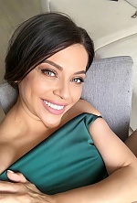 Ukrainian mail order bride Tatyana from Odessa with black hair and green eye color - image 5