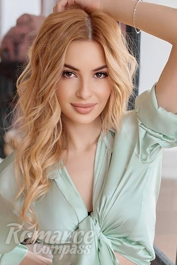 Ukrainian mail order bride Victoria from Lviv with blonde hair and brown eye color - image 1