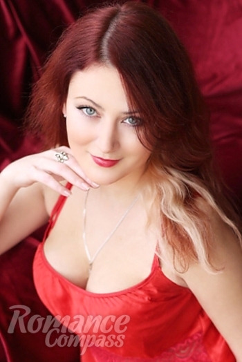 Ukrainian mail order bride Yana from Cherkassy with red hair and blue eye color - image 1