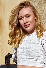 Ukrainian mail order bride Raya from Kiev with blonde hair and green eye color - image 6