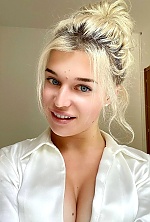 Ukrainian mail order bride Anastasiia from Kiev with blonde hair and blue eye color - image 3