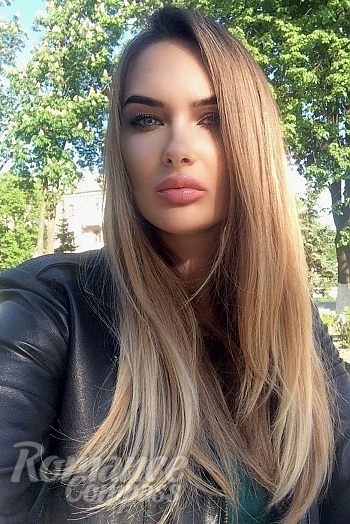 Ukrainian mail order bride Yuliia from Kharkiv with light brown hair and grey eye color - image 1