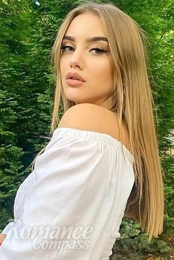 Ukrainian mail order bride Mariia from Chernivtsi with light brown hair and blue eye color - image 1