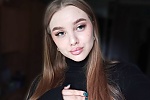 Ukrainian mail order bride Mariia from Chernivtsi with light brown hair and blue eye color - image 6