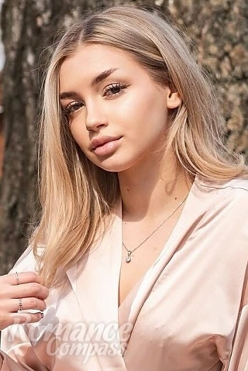 Ukrainian mail order bride Polina from Rivne with blonde hair and green eye color - image 1