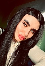 Ukrainian mail order bride Alina from Kiev with black hair and green eye color - image 3