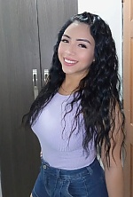Ukrainian mail order bride Oriana from Medellin with black hair and hazel eye color - image 11