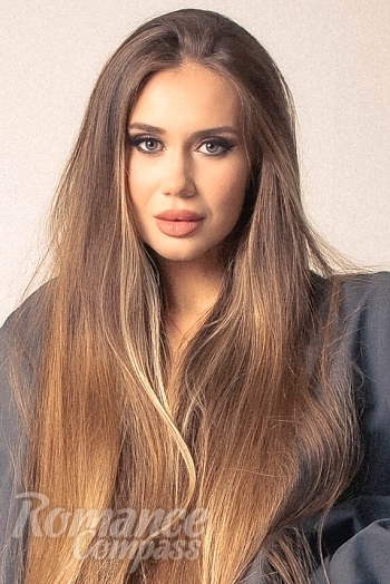 Ukrainian mail order bride Mariia from Kiev with light brown hair and blue eye color - image 1