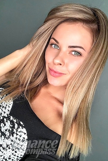 Ukrainian mail order bride Anastasia from Kiev with light brown hair and grey eye color - image 1