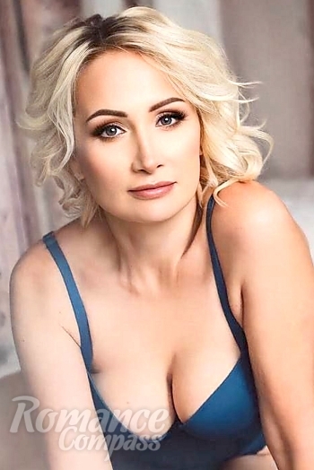 Ukrainian mail order bride Natalia from Miami with blonde hair and grey eye color - image 1