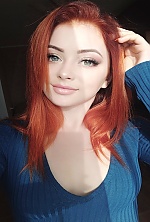 Ukrainian mail order bride Natalia from Warsaw with red hair and green eye color - image 4